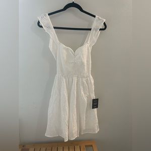 Lulu’s Sweetly Sincere White Ruffled Eyelet Embroidered Mini Dress